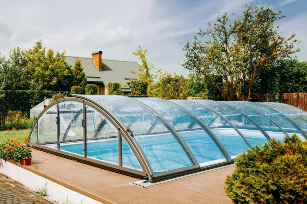 Choosing the Right Pool Cover: Sliding Roofs, Roller Covers, or Domes